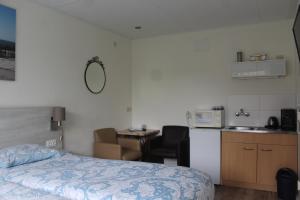 Postel nebo postele na pokoji v ubytování B&B Papillon