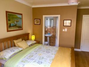 Postel nebo postele na pokoji v ubytování Rugged Glen Accommodation