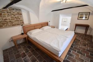 Posteľ alebo postele v izbe v ubytovaní Sammer Residenz, Breitenbrunn am Neusiedlersee