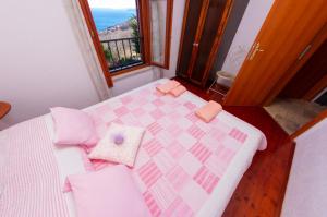 Postel nebo postele na pokoji v ubytování Kuca Kata - Property Nono