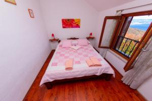 Postel nebo postele na pokoji v ubytování Kuca Kata - Property Nono