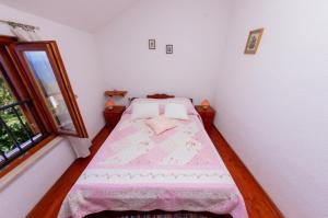 Postel nebo postele na pokoji v ubytování Kuca Kata - Property Nono