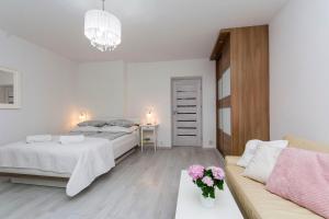 Posteľ alebo postele v izbe v ubytovaní Twój Salon-Apartamenty Stare Miasto
