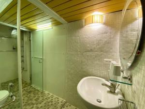 Koupelna v ubytování Ho Feng Private Hotel 電梯自助民宿