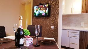 TV a/nebo společenská místnost v ubytování Monte Liza