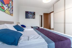 Tempat tidur dalam kamar di Casa da Suite Zeta