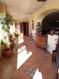 Kuchyň nebo kuchyňský kout v ubytování Hotel Sassacci