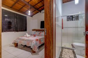 Um banheiro em Pousada Residenzial Cariocare