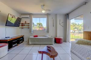 Uma área de estar em Pousada Residenzial Cariocare