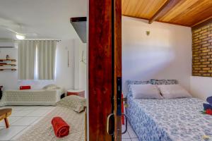 Cama ou camas em um quarto em Pousada Residenzial Cariocare