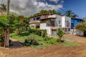 Um jardim em Pousada Residenzial Cariocare