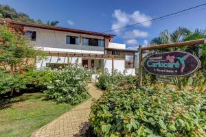 Um jardim em Pousada Residenzial Cariocare