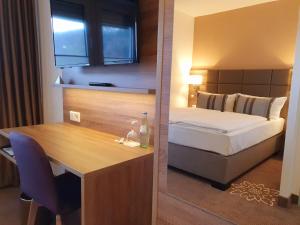 Postel nebo postele na pokoji v ubytování Hotel in den Herrnwiesen