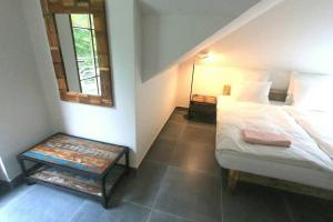 Posteľ alebo postele v izbe v ubytovaní The Mountain Loft Klinovec - with infrasauna