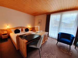 Postel nebo postele na pokoji v ubytování Hotel in den Herrnwiesen