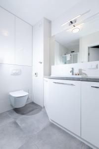 Koupelna v ubytování Resort Apartamenty Klifowa Rewal 30