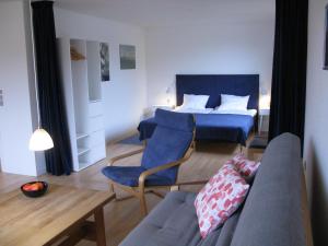 מיטה או מיטות בחדר ב-Fuglevænget