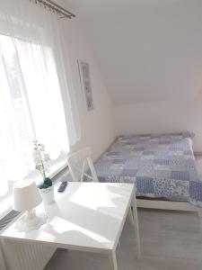 Postel nebo postele na pokoji v ubytování Dom Gościnny u Doroty