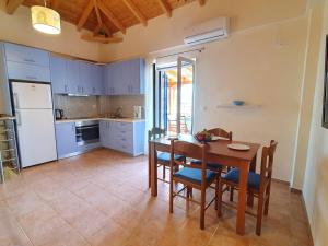 A kitchen or kitchenette at Stoupa Lefktro 9