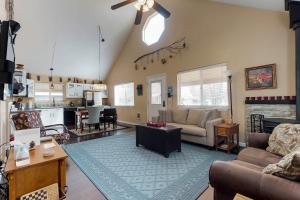 a living room with a couch and a table at Gunni Getaway in Gunnison