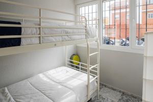 Posteľ alebo postele v izbe v ubytovaní MalagaOnBeach 2 - Two bedrooms - up to 3 people - 30 meters beach
