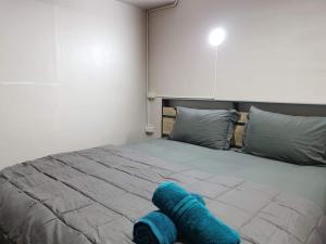 Postel nebo postele na pokoji v ubytování SMILE HOME GUESTHOUSE
