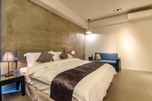 Giường trong phòng chung tại 礁溪320山館 Jiaoxi Shanguan B&B