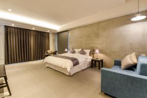 Giường trong phòng chung tại 礁溪320山館 Jiaoxi Shanguan B&B