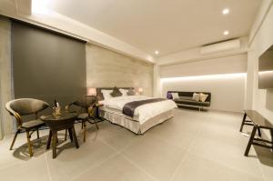 Giường trong phòng chung tại 礁溪320山館 Jiaoxi Shanguan B&B