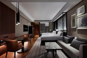 TV i/ili multimedijalni sistem u objektu Xianghu Xiaoyao Manor