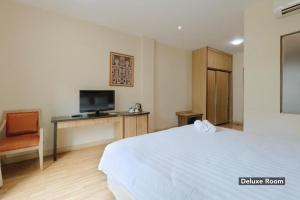 Sjónvarps- og/eða afþreyingartæki á Mutiara Suites