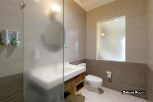 Baðherbergi á Mutiara Suites