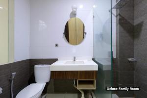 Baðherbergi á Mutiara Suites
