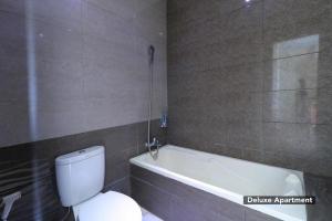 Baðherbergi á Mutiara Suites