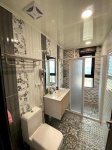 Koupelna v ubytování 奧斯卡海景民宿Oscar Boutique Seaview Homestay + 37 fotografií