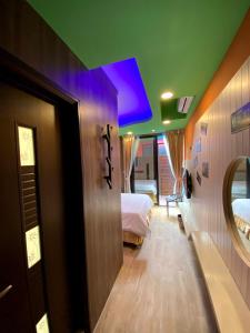 Letto o letti in una camera di 奧斯卡海景民宿Oscar Boutique Seaview Homestay