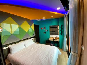 Letto o letti in una camera di 奧斯卡海景民宿Oscar Boutique Seaview Homestay