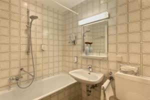 Koupelna v ubytování Posthotel Kolberbräu
