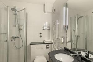 Koupelna v ubytování Posthotel Kolberbräu