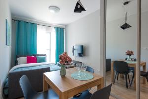 Posteľ alebo postele v izbe v ubytovaní Wagonowa P&O Apartments