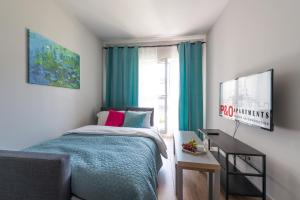Posteľ alebo postele v izbe v ubytovaní Wagonowa P&O Apartments