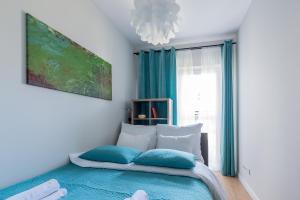 Posteľ alebo postele v izbe v ubytovaní Wagonowa P&O Apartments
