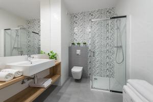 Kúpeľňa v ubytovaní Wagonowa P&O Apartments