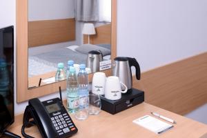 Posteľ alebo postele v izbe v ubytovaní Tailor Hotel Sport & Conference