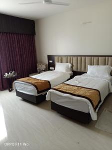 The Hotel Celebration客房内的一张或多张床位