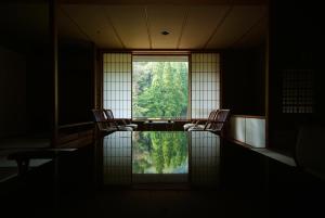 Area soggiorno di Kinosaki Onsen Nishimuraya Hotel Shogetsutei