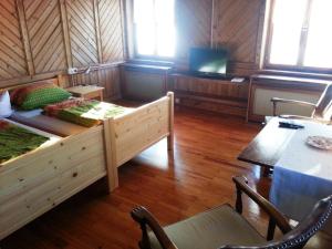 TV a/nebo společenská místnost v ubytování Ferienhaus Eulenhof