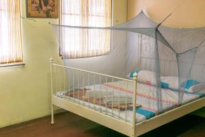 Postel nebo postele na pokoji v ubytování Voyage Guesthouse