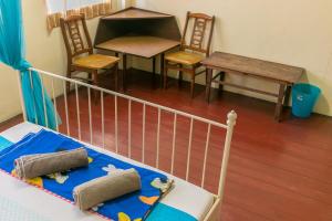 Postel nebo postele na pokoji v ubytování Voyage Guesthouse