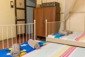 Postel nebo postele na pokoji v ubytování Voyage Guesthouse